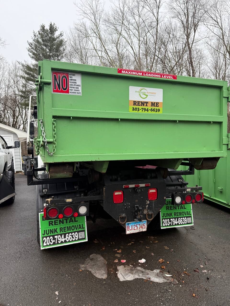 Greenway truck on wooded driveway
